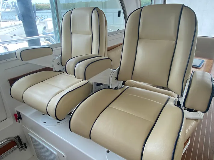  Yacht Photos Pics Luxurious beige leather seats on a 2014 Back Cove 41 yacht.