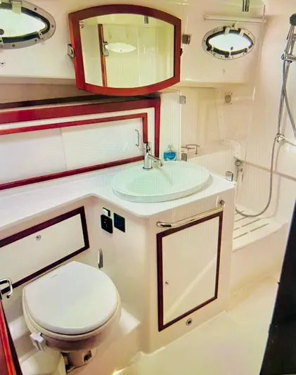  Yacht Photos Pics 2014 Back Cove 41 yacht bathroom with sink, toilet, and shower.