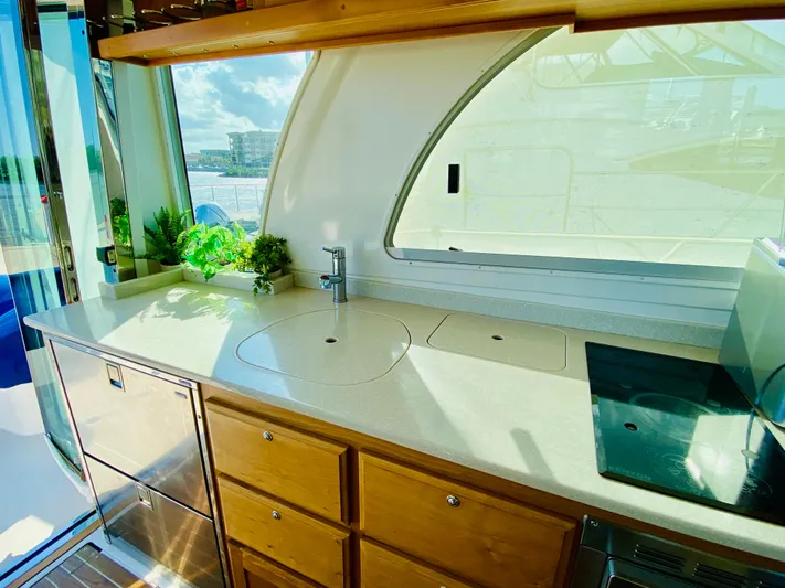  Yacht Photos Pics Luxurious kitchen area on a 2014 Back Cove 41 yacht with modern amenities.