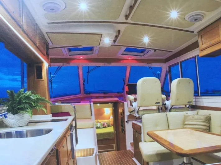  Yacht Photos Pics Luxurious interior of 2014 Back Cove 41 yacht with modern seating and elegant design.