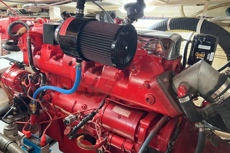  Yacht Photos Pics Engine of 1990 Grand Banks 36 Classic, featuring red components and visible filter.