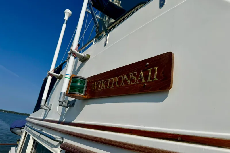  Yacht Photos Pics 1990 Grand Banks 36 Classic boat with "Wikitonsai II" nameplate, sailing on a clear day.