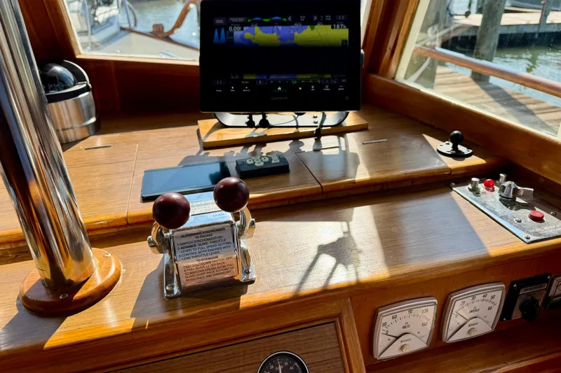  Yacht Photos Pics 1990 Grand Banks 36 Classic helm with navigation equipment and controls.