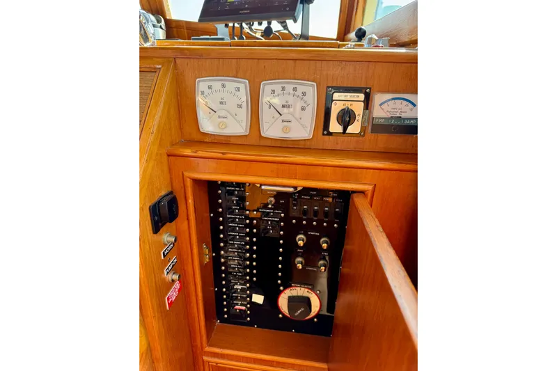  Yacht Photos Pics Control panel of 1990 Grand Banks 36 Classic boat with gauges and switches.