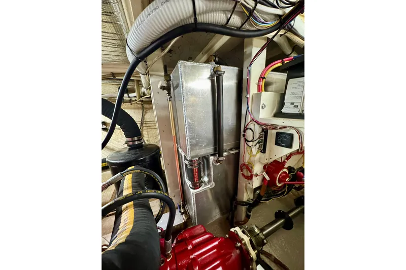  Yacht Photos Pics Engine room of 1990 Grand Banks 36 Classic with visible mechanical components.