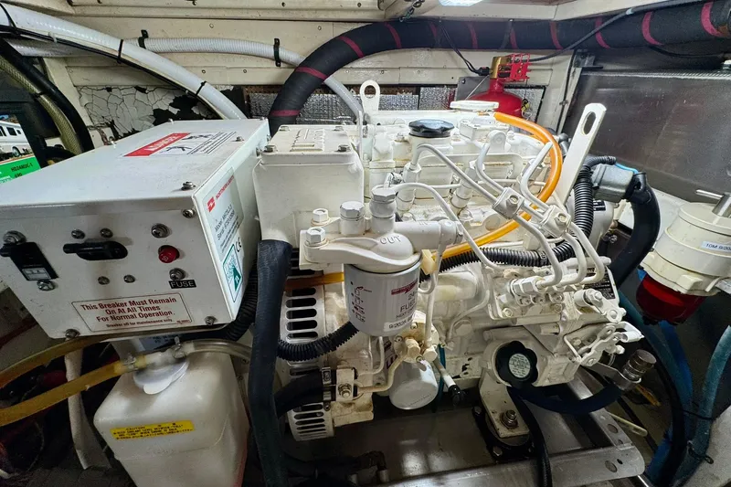  Yacht Photos Pics Engine room of 1990 Grand Banks 36 Classic with visible machinery and wiring.