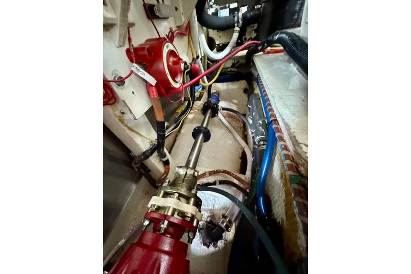  Yacht Photos Pics Engine compartment of a 1990 Grand Banks 36 Classic boat, showcasing mechanical components.