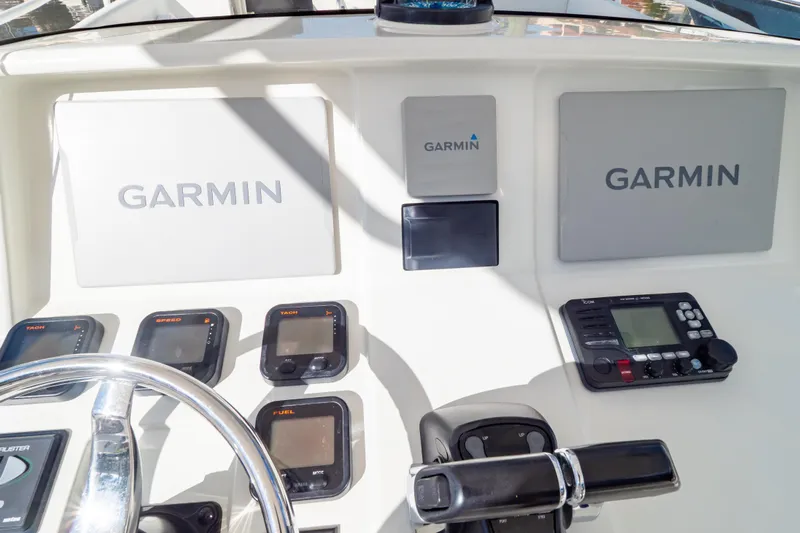  Yacht Photos Pics Dashboard of 2003 Intrepid 370 Cuddy with Garmin navigation and control systems.