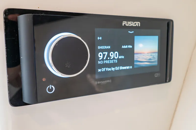  Yacht Photos Pics Fusion marine stereo display on 2003 Intrepid 370 Cuddy, tuned to 97.90 MHz.