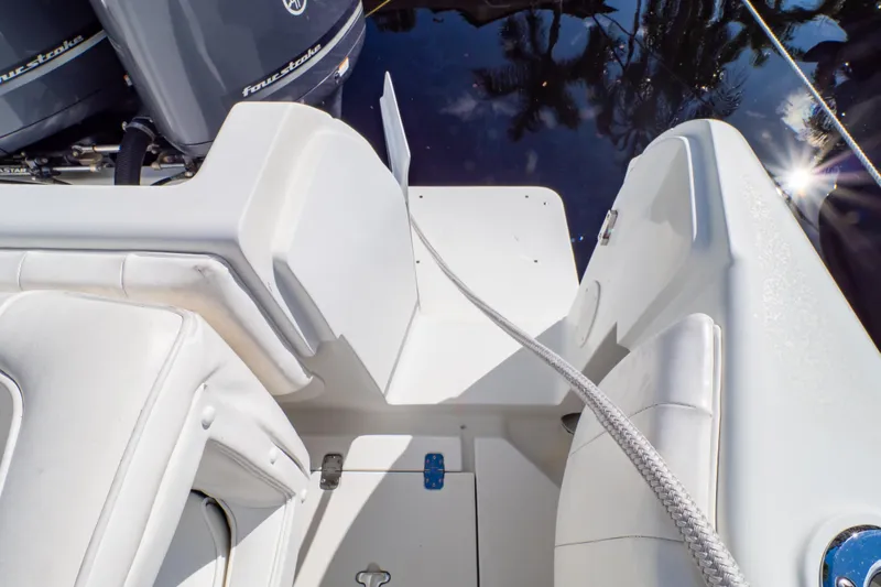  Yacht Photos Pics 2003 Intrepid 370 Cuddy boat deck with seating and outboard motors.