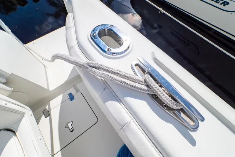  Yacht Photos Pics 2003 Intrepid 370 Cuddy boat deck with cleat and rope detail.