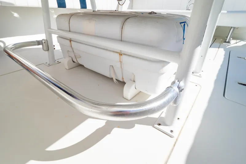  Yacht Photos Pics 2003 Intrepid 370 Cuddy boat interior with secured equipment and metal railing.
