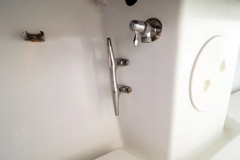  Yacht Photos Pics 2003 Intrepid 370 Cuddy boat deck with cleat and faucet detail.