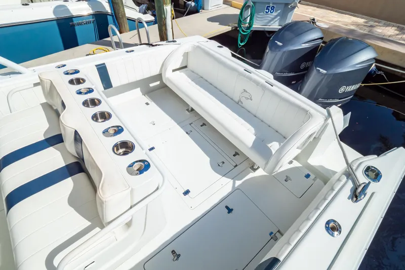  Yacht Photos Pics 2003 Intrepid 370 Cuddy boat interior with seating and dual Yamaha outboard engines.