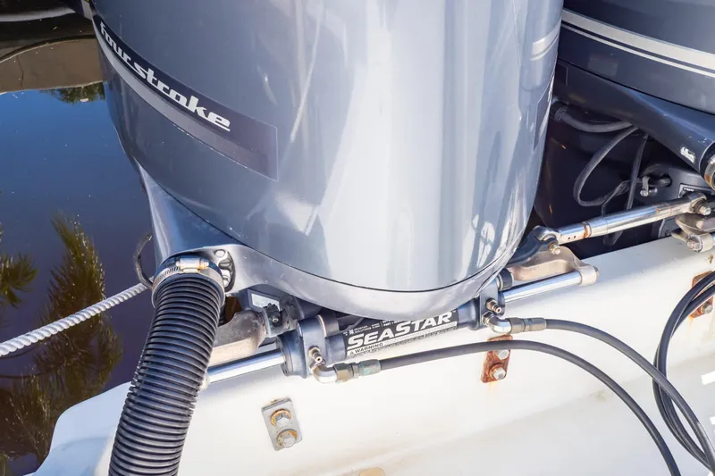  Yacht Photos Pics Outboard motor of 2003 Intrepid 370 Cuddy with SeaStar hydraulic steering system.