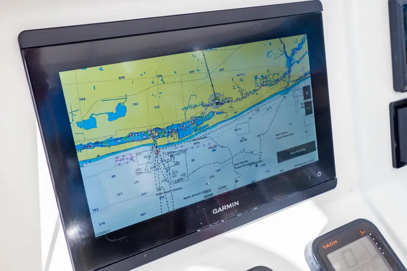  Yacht Photos Pics Garmin navigation display on 2003 Intrepid 370 Cuddy boat, showing detailed marine chart.