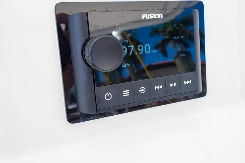  Yacht Photos Pics Fusion marine stereo system on a 2003 Intrepid 370 Cuddy boat dashboard.