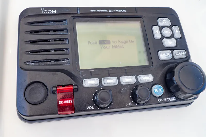  Yacht Photos Pics VHF marine radio on 2003 Intrepid 370 Cuddy boat, featuring distress button.