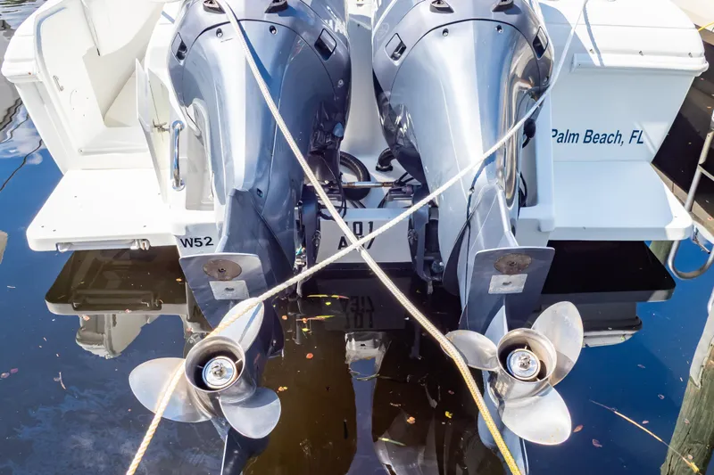  Yacht Photos Pics Twin outboard motors on a 2003 Intrepid 370 Cuddy, docked in Palm Beach, FL.