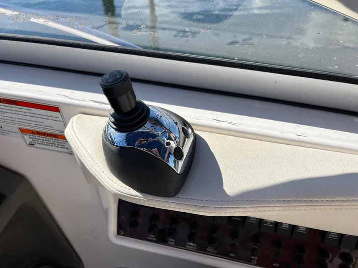 Souper Tuscan Yacht Photos Pics Joystick control on 2011 Regal 35 Express Cruiser dashboard.