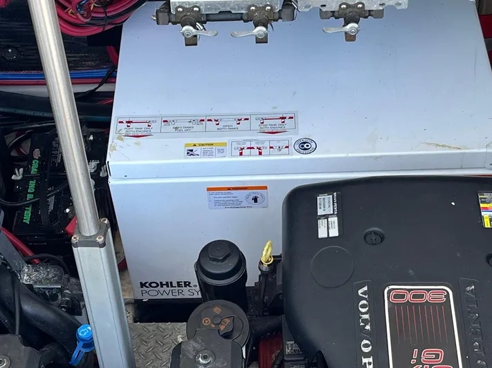 Souper Tuscan Yacht Photos Pics Engine compartment of a 2011 Regal 35 Express Cruiser with Kohler power system.