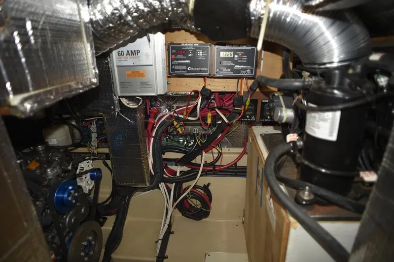 Watermark Lll Yacht Photos Pics Engine room of 2005 Island Packet 445 sailboat, showing wiring, equipment, and components.