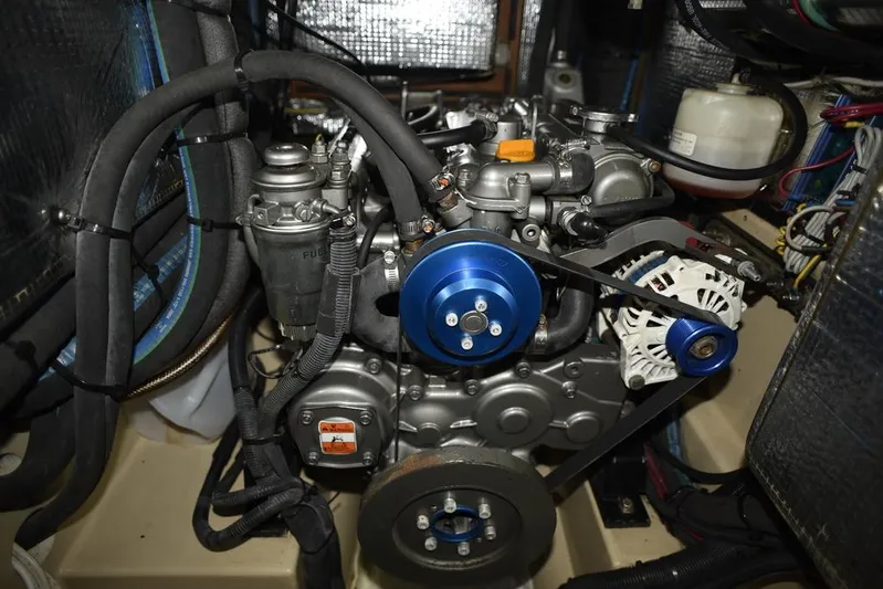 Watermark Lll Yacht Photos Pics Engine compartment of a 2005 Island Packet 445 sailboat, showcasing mechanical components and wiring.