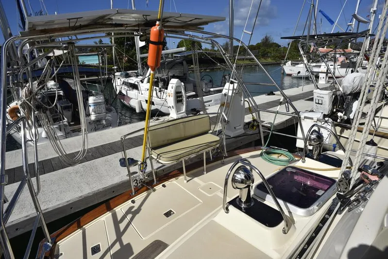 Watermark Lll Yacht Photos Pics 2005 Island Packet 445 sailboat docked at marina, featuring spacious deck and equipment.