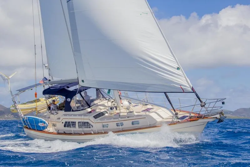 Watermark Lll Yacht Photos Pics Sailing yacht Island Packet 445, 2005 model, cruising on open sea under clear skies.