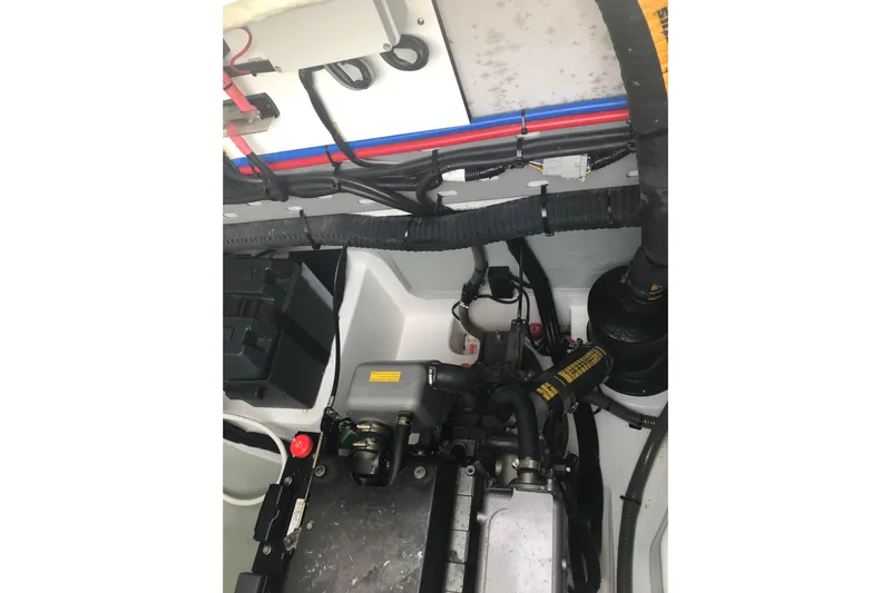 Flip Flops Yacht Photos Pics Engine compartment of a 2017 Leopard 48 yacht, showcasing wiring and components.