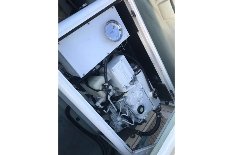 Flip Flops Yacht Photos Pics Engine compartment of a 2017 Leopard 48 yacht, showcasing mechanical components.