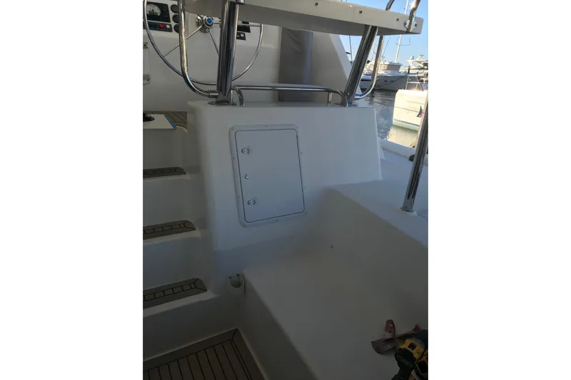 Flip Flops Yacht Photos Pics Helm station of 2017 Leopard 48 yacht with steps and control panel.