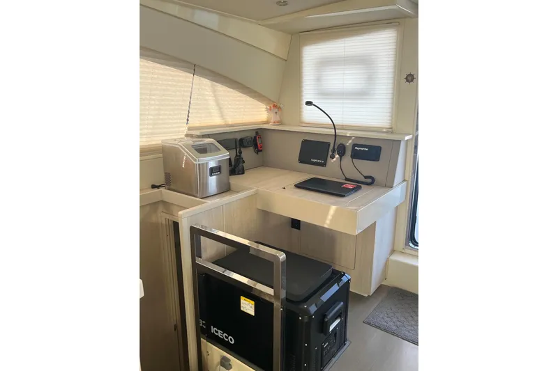 Flip Flops Yacht Photos Pics Interior of 2017 Leopard 48 yacht with navigation equipment and appliances.