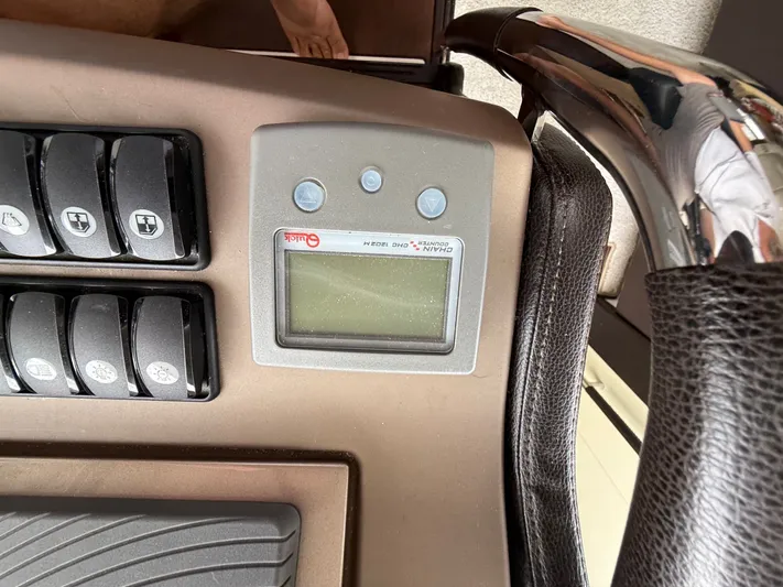 Smiles Away Yacht Photos Pics Control panel of a 2018 Prestige 500 S yacht with buttons and display.
