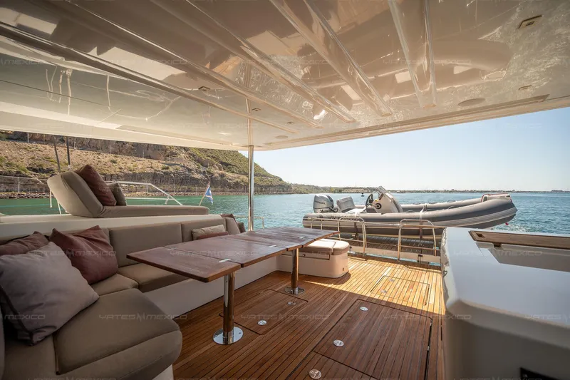  Yacht Photos Pics Luxurious 2023 Lagoon 55 yacht interior with elegant seating and scenic ocean view.