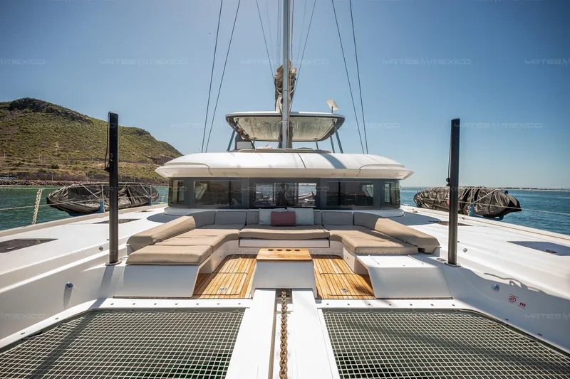  Yacht Photos Pics Luxurious 2023 Lagoon 55 yacht with spacious deck and scenic ocean view.