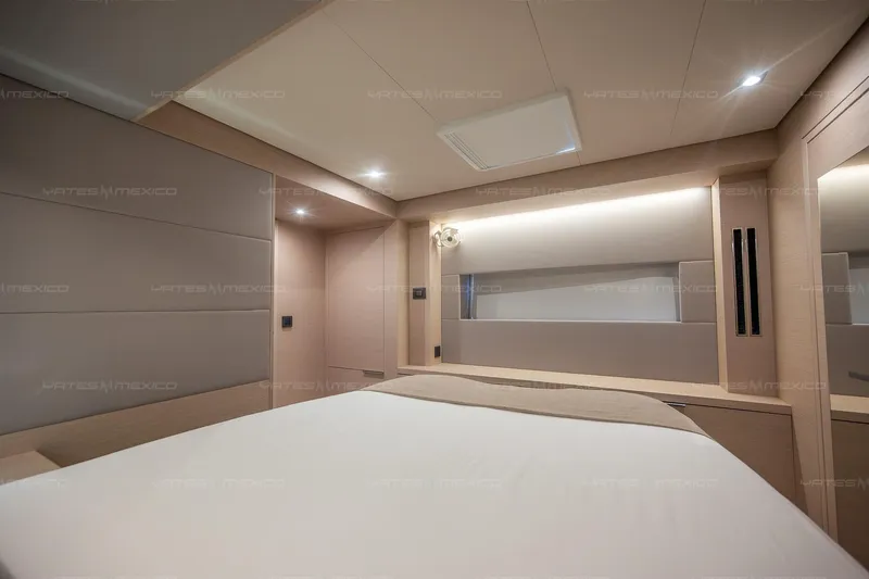  Yacht Photos Pics Luxurious interior cabin of 2023 Lagoon 55 yacht, featuring modern design and ambient lighting.