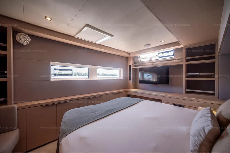  Yacht Photos Pics Luxurious interior of 2023 Lagoon 55 yacht cabin with modern design and ample natural light.