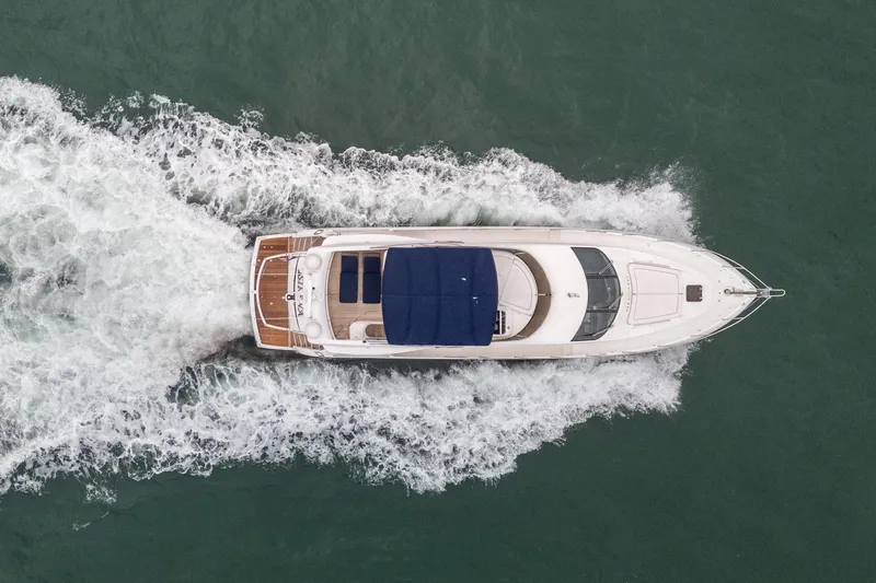  Yacht Photos Pics Aerial view of 2008 Sunseeker Manhattan 70 yacht cruising on the water.
