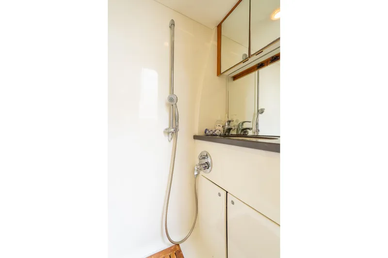  Yacht Photos Pics Luxurious bathroom in 2008 Sunseeker Manhattan 70 yacht with modern shower and sleek design.