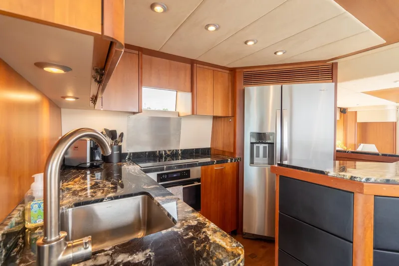  Yacht Photos Pics Luxurious kitchen interior of 2008 Sunseeker Manhattan 70 yacht with modern appliances.