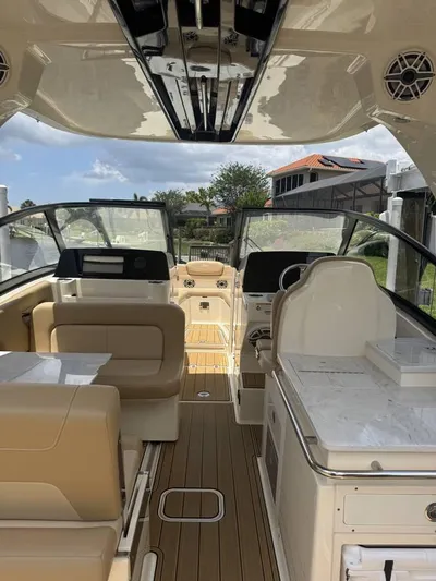  Yacht Photos Pics 2023 Scout 277 Dorado boat interior with luxurious seating and modern amenities.