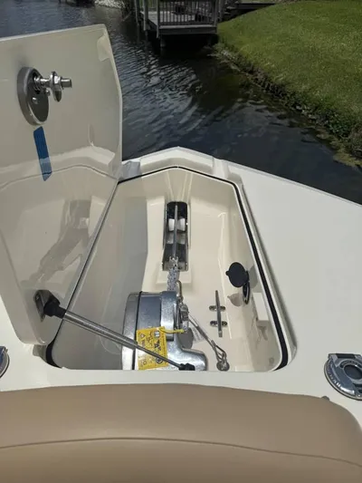  Yacht Photos Pics 2023 Scout 277 Dorado boat anchor compartment by the water.