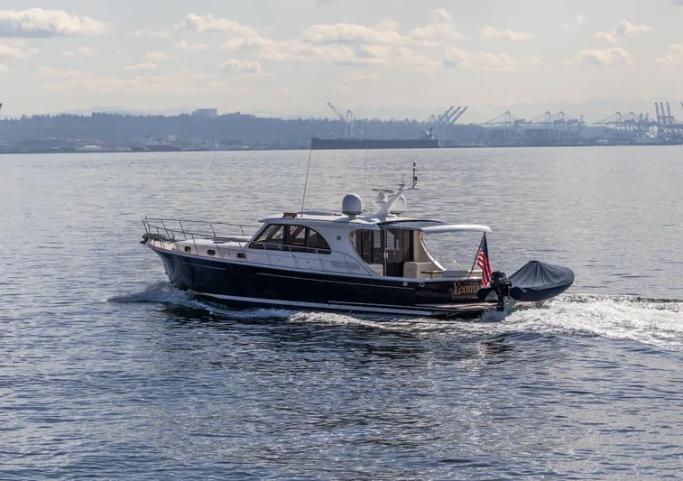 Yeomalt Yacht Photos Pics 2014 Grand Banks 50 Eastbay SX cruising on calm waters.