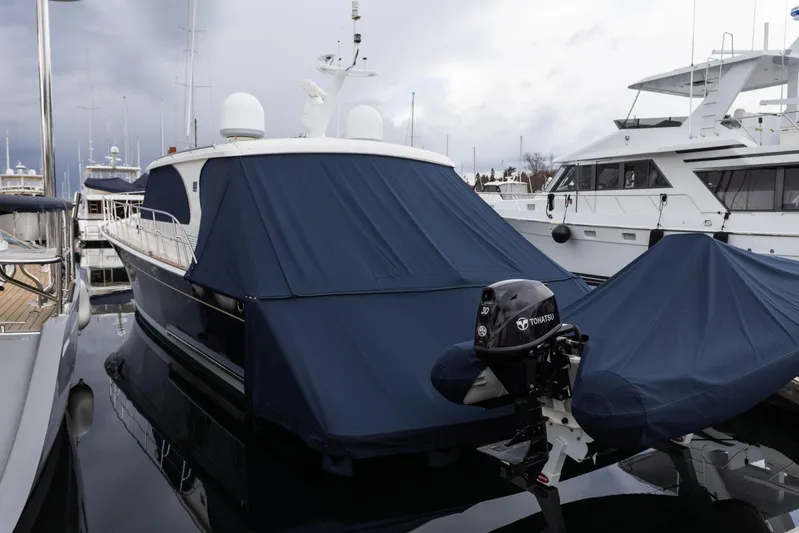 Yeomalt Yacht Photos Pics 2014 Grand Banks 50 Eastbay SX yacht docked with blue covers.