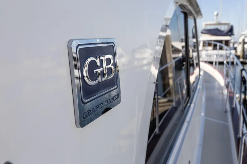 Yeomalt Yacht Photos Pics 2014 Grand Banks 50 Eastbay SX yacht with GB logo at marina.