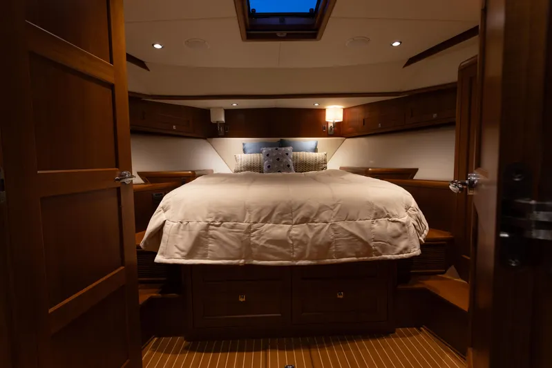 Yeomalt Yacht Photos Pics Luxurious bedroom interior of 2014 Grand Banks 50 Eastbay SX yacht.