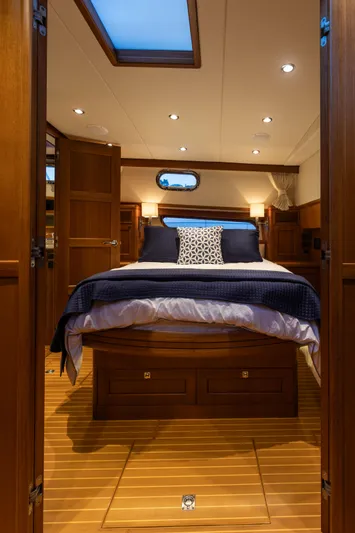 Yeomalt Yacht Photos Pics Luxurious bedroom interior of 2014 Grand Banks 50 Eastbay SX yacht.