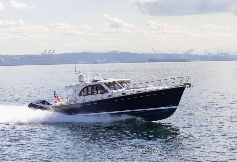 Yeomalt Yacht Photos Pics 2014 Grand Banks 50 Eastbay SX cruising on open water.