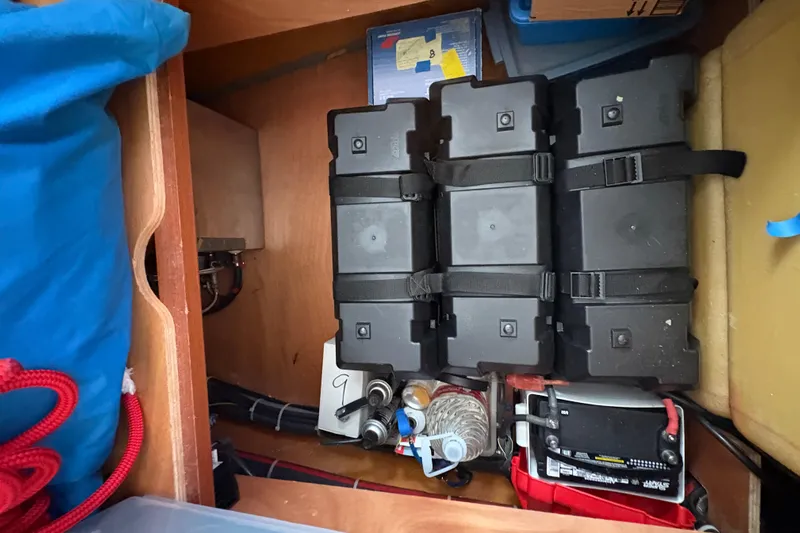 Toucan Deux Yacht Photos Pics Storage compartment in a 2004 Lagoon 380 boat with batteries and equipment.